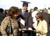 Joel Brunson, nursing graduate, shows off his diploma after fall graduation.  - Photo by Matthew Diggs