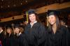 Danielle Pope, mathematics graduate, and Eunice Sung, biology/chemistry graduate, take their places at the beginning of the fall graduation ceremony. - Photo by Morris Abernathy