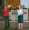 During Klemata meetings time is devoted to praise and worship.  Pictured here leading in worship is (left to right) Mary Woodard, senior psychology major; Katie Woodruff, Women's Basketball's Assistant Coach; Lauren Webb, junior chemistry major; Cindy Harrill, sophomore management major. - Photo by Kristen Hiller