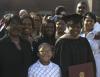 Stephanie Greer, MBA graduate from the Germantown campus, poses with her family after the fall graduation ceremony. - Photo by Stephanie Schroeder