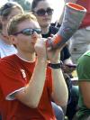 Junior Brian Burns, DMS major, makes some noise to support the men's soccer team.   - Photo by Matthew Diggs