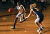 Lady Bulldog LaTorya Fuller drives past the defense of Mid-Continent University, Ky. - Photo by Matthew Diggs