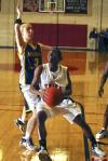 Lady Bulldog LaTorya Fuller evades defenders during a game against Mid-Continent University, Ky. - Photo by Matthew Diggs