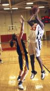 D.J. Sissoko goes up for a jump shot during a game against Blue Mountain College, Miss. - Photo by Matthew Diggs