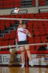 Senior Monica Schirmer returns the ball. - Photo by Morris Abernathy