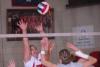 Senior Monica Schirmer goes up for a block. - Photo by Morris Abernathy