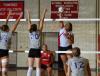 Lady Bulldog senior Monica Schirmer spikes the ball. - Photo by Morris Abernathy