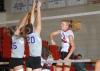 Amanda Hutchison, Union sophomore, spikes the ball over the defenders. - Photo by Morris Abernathy