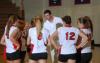 Head coach Steven Gream gives the Lady Bulldogs some instruction between matches. - Photo by Morris Abernathy