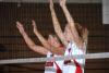Sophomore Amanda Hutchison and junior Kelly Huffines get set for the serve. - Photo by Morris Abernathy