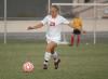 Caitlin Clinger kicks the ball down field to help set up the Union offense. - Photo by Steven Aldridge