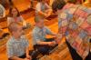 Betty Bedsole, professor of music, works with members of the Children's Choir on Orff instruments. - Photo by Morris Abernathy