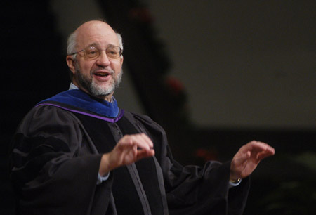 Music department chair Dr. Richard Joiner leads music during the Union's December graduation ceremony.