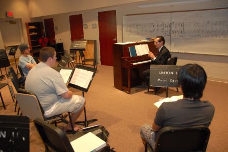Ron Boud, professor of music, leads a music theory class.