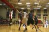 Brian Lake shoots the ball as Deywane Lee helps block opponents from Trevecca Nazarene University. The game ended in a victory for the Union Bulldogs. - Photo by Stephanie Schroeder