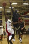 A Trevecca Nazarene University opponent attempts to block a Tony Brown shot. - Photo by Stephanie Schroeder