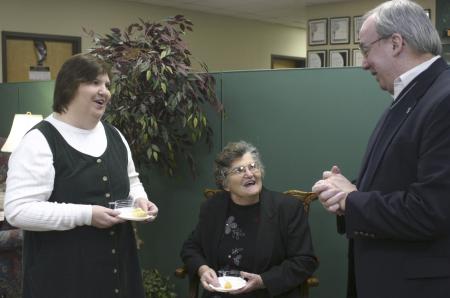 President Dockery talks with Jeannie Byrd and her mother Garvalene during a reception held for Jerry Tidwell after chapel outside the President's Office.