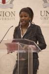 Junior Nikita Taylor presented a biographical sketch of Rosa Parks during the First Annual Black History Month Program. - Photo by Wayne Holmes