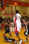 Sophomore Brian Lake takes a short jumper in Union's opening game of the TranSouth Conference Tournament. - Photo by Morris Abernathy