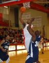 Brian Lake goes up for a shot against the Lambuth defense in the semi-final game of the TranSouth Tournament. - Photo by Morris Abernathy