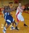 Senior Ben Frederick fights for position against Lambuth during overtime in the semi-final game of the TranSouth Tournament. - Photo by Morris Abernathy