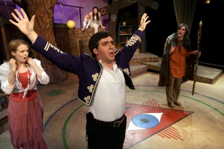 Bryan Spillman as Ferdinand (center) is controlled by Josh Wilkinson as Prospero (right) as Catherine Schulz as Ariel (back) and Emily Watlington as Miranda (left) looks on in disbelief.