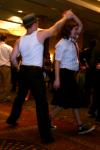 Jay Gunn spins Junior Rachel Hoyt during SAC's Swing Dance at the Andrew Jackson Ballroom of the Double Tree Hotel. - Photo by Stephanie Schroeder