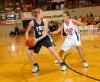 Freshman Kaitlin Dudley guards a Master's College player during the first round of the NAIA National Tournament. - Photo by Morris Abernathy