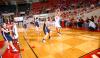 Freshman Lindsay Flynn looks to make a pass inside during the first round of the NAIA National Tournament. - Photo by Morris Abernathy
