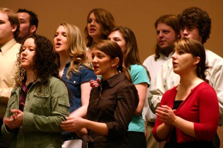 The University Singers sing <em>Praise His Holy Name</em> during chapel.