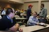 Junior Josh Armacost talks with Dr. Gregory Thornbury, dean of School of Christian Studies, while Senior Bryan Spillman talks with Dr. David Gushee, Graves professor of moral philosophy, before a forum on the issue of homosexuality. - Photo by Stephanie Schroeder