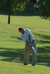 Gary Glapa digs a shot out of the edge of the rough during the Union Invitational at Falcon Ridge Golf Club. - Photo by Morris Abernathy