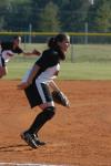 Mandy Elder gets ready for a play at third base.  Shortstop Ashley Walters reacts to the play as well. - Photo by Steven Aldridge