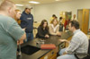 Kirby Atkins speaks with a small group of DMS majors after his talk on computer animation and digital filmmaking. - Photo by Jim Veneman