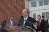 President Dockery presents stats about White Hall during the dedication.  The 63,345 square foot building contains 66 miles of electrical wiring and 23 miles of networking cabling. - Photo by Morris Abernathy
