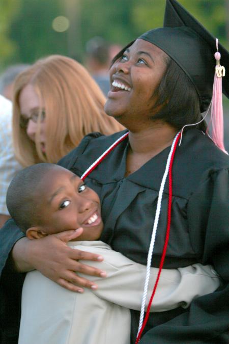 Music Performance graduate Jennifer and Matthew Nelson joyfully embrace following Union's 182nd annual spring graduation ceremony.