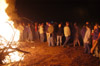 <i>Tornado Bonfire:</i> The Union community gathered on the Tuesday night after the tornado to celebrate their safety and to get rid of some tornado-downed trees. - Photo by Jim Veneman