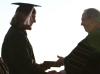 Art graduate Ariel Gee receives his diploma from President Dockery at the spring 2007 graduation. - Photo by Kyle Kurlick