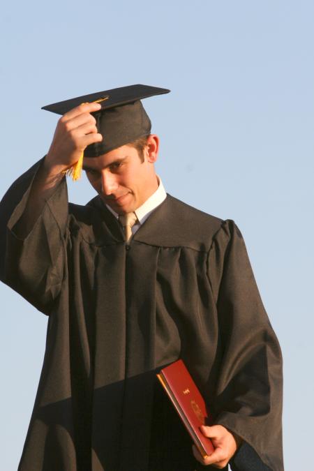 Biology graduate Justin Hutto turns his tassel after receiving his diploma at the spring 2007 graduation ceremony.
