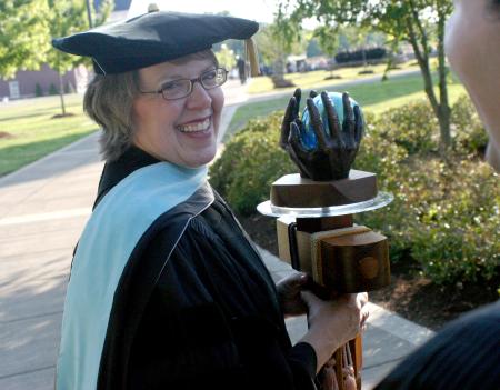 Faculty Member of the Year Dottie Myatt carries the mace in front of the faculty processional preceding spring 2007 graduation.