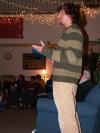 D.L. Fruge welcomes students to President Dockery's reading of the Christmas story. - Photo by Beth Spain