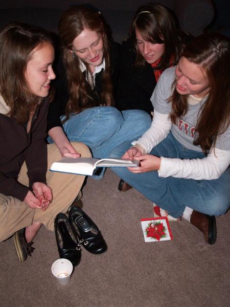 Students sang carols before Predsient Dockery read the Christmas story in the McAfee Commons.