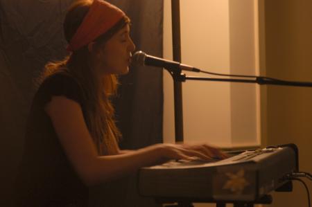 Recording artist Brooke Waggoner performs for an AIDS relief concert in McAfee commons presented by PRSSA.