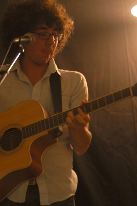 Recording artist David Condos performs for an AIDS relief concert in McAfee commons presented by PRSSA.