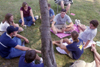 Patrick Compau's FOCUS group fellowships on the lawn during a picnic lunch in The Grove during New Student Orientation. - Photo by Kasey Carty-Campbell