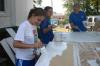 Emily Watkins, Devon Sledd and Victoria Allen paint cabinet doors as a part of a Rising Senior project at The Care Center in downtown Jackson. - Photo by Stephanie Schroeder