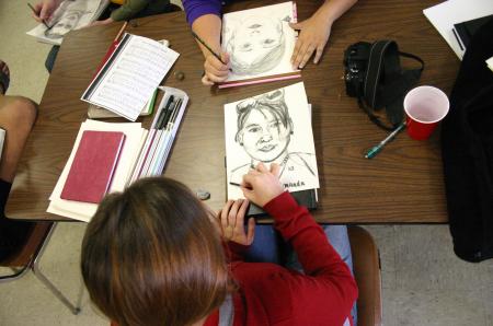 Students at the art retreat took turns creating portraits of each other.