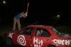 Jonathan Lambach destroys a car at the Frost Fest. - Photo by Kyle Kurlick