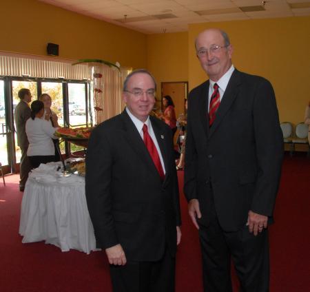 President Dockery poses with Jim Moss, retiring president and CEO of West Tennessee Healthcare, who was presented with an honorary Doctor of Humanities degree during the August graduation ceremony.