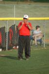 Head Coach David Blackstock encourages his players from the third base coaching box. - Photo by Steven Aldridge